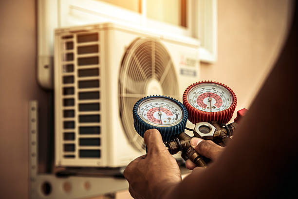 Professional Air Conditioning Service technician working in Mechanicsville, MD